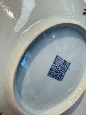 Four Chinese famille rose saucers and a gilt-decorated powder-blue-ground saucer, Qianlong and Jiaqing marks, 18/19th C. — photo 51
