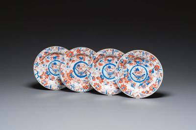 Four Chinese Imari-style plates with raised central roundels, Kangxi