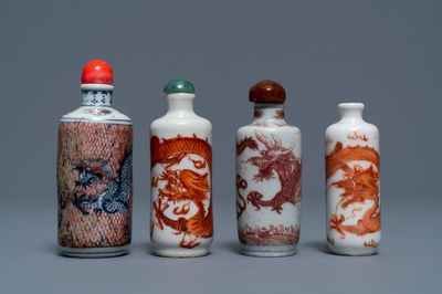 Four Chinese iron- and copper-red porcelain 'dragon' snuff bottles, 19/20th C.