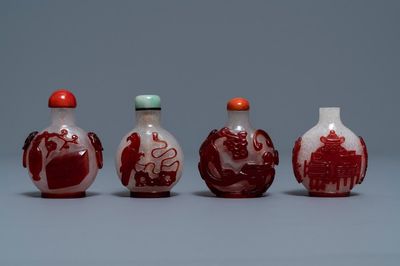 Four Chinese red overlay snowflake glass snuff bottles, 18/20th C.