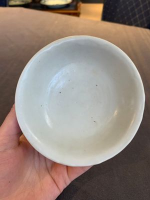 Four Chinese white-glazed saucers and three bowls, Yuan/Ming — photo 11