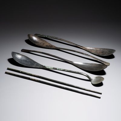 Four Korean or Chinese bronze spoons and a pair of chopsticks, Goryeo/Liao