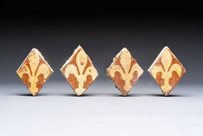 Four medieval slip-decorated ‘Fleur-de-Lys’ tiles, France, 15/16th C.