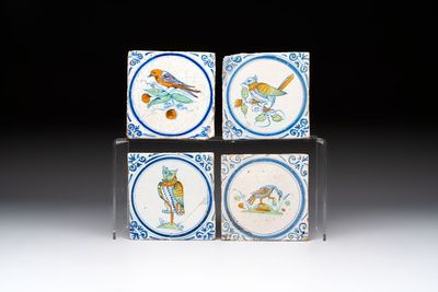 Four polychrome Dutch Delft 'bird' medallion tiles, 17th C.
