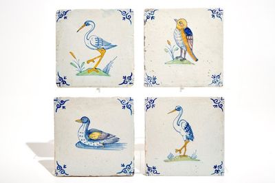 Four polychrome Dutch Delft tiles with birds, 17th C.