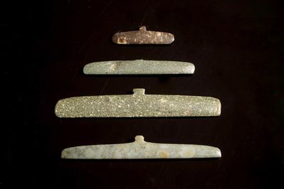 Four serpentine pectorals, Tairona culture, Colombia, 15/10th C. BC