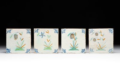 Four unusual polychrome Dutch Delft 'flower' tiles, 17th C.