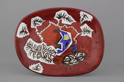 Jean Lurçat (1892-1966), an oval red ground dish, 20th C.
