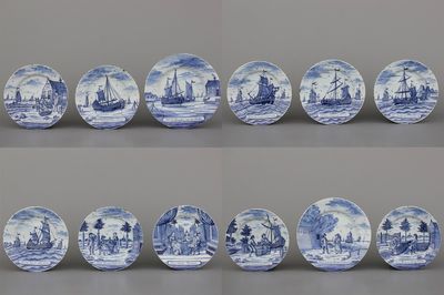 Lot van 12 blauw en witte Delftse borden met decor van de "Haringvangst", 18e eeuw