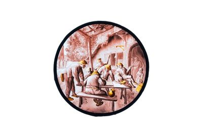 Médaillon en verre peint à décor des 'Joueurs de trictrac' d'après Adriaen van Ostade, Pays-Bas méridionaux, 17/18ème