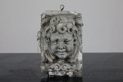 Moulage en plâtre d'une tête de chérubin, atelier De Wispelaere, Bruges, 1e moitié 20e
