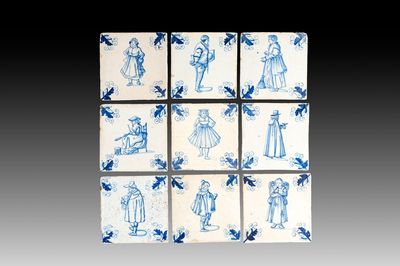 Nine blue and white Dutch Delft tiles with oak leaf corners, 17th C.