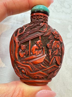 Nine Chinese cinnabar lacquer snuff bottles and a covered box, Qianlong marks, 19/20th C. — photo 51