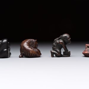 Nine various Japanese netsuke, an inro, a tsuba, a yatate, a bamboo kiseruzutsu and a covered bronze box, Edo/Meiji, 19th C. — photo 11