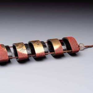 Nine various Japanese netsuke, an inro, a tsuba, a yatate, a bamboo kiseruzutsu and a covered bronze box, Edo/Meiji, 19th C. — photo 20