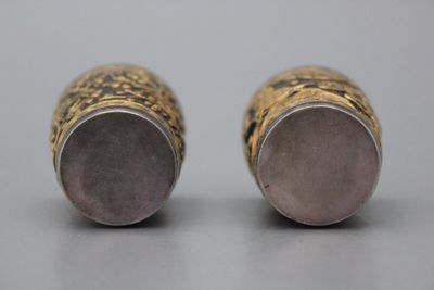 Paar Chinese zilveren en gouden wijn cup, ca. 1900