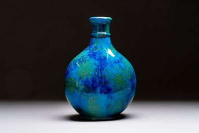 Paul Millet (1870-1950) for Sèvres: A fine blue, turquoise and yellow flambé-glazed bottle vase, late 19th C.