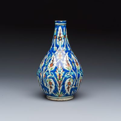 A Kutahya Iznik-style bottle vase with saz leaves, Turkey, 19th C.