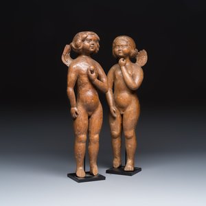 A pair of carved wooden figures of winged angels — photo 1