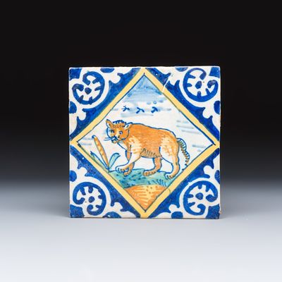 A rare Dutch Delft maiolica 'diamond' tile with a leopard, ca. 1600
