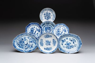 Seven Chinese blue and white plates and dishes with floral design, 18th C.