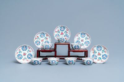 Seven Chinese famille rose cups and five saucers, Qianlong
