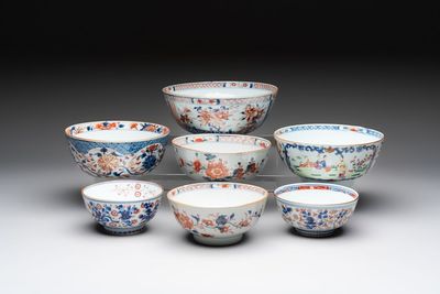 Seven Chinese Imari-style and famille rose bowls with floral and figural designs, 18th C.
