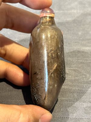 Seven Chinese smoky quartz, agate and hardstone snuff bottles, 19/20th C. — photo 33