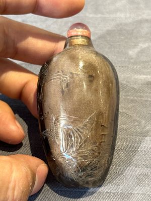 Seven Chinese smoky quartz, agate and hardstone snuff bottles, 19/20th C. — photo 34