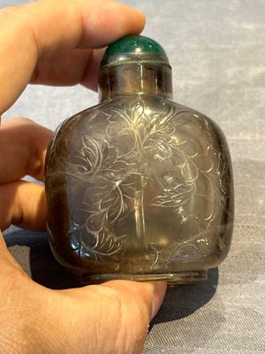 Seven Chinese smoky quartz, agate and hardstone snuff bottles, 19/20th C. — photo 50