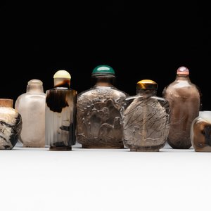 Seven Chinese smoky quartz, agate and hardstone snuff bottles, 19/20th C. — photo 1