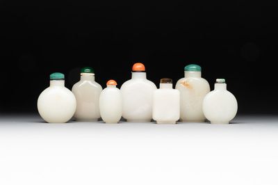 Seven Chinese white and celadon jade snuff bottles, 19th C.