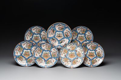 Seven Dutch Delft polychrome 'flower basket' plates, 18th C.