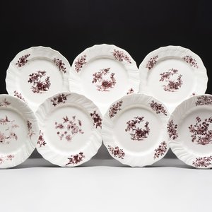 Seven manganese Tournai porcelain plates with floral design, 18th C. — photo 1