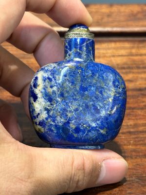 Seven varied Chinese snuff bottles of precious stone, red coral, glass and amber, 19th C. — 照片 29