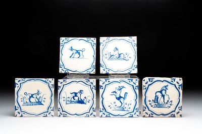 Six blue and white Dutch Delft 'accolades borders' 'animals' tiles, 17th C.