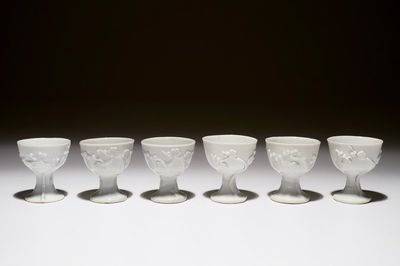 Six Chinese blanc de Chine stem cups with applied floral sprigs, 18/19th C.
