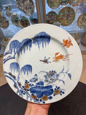 Six Chinese blue and white 'floral' bowls, a pair of dishes, a saucer and an iron-red-decorated plate, Qianlong — photo 18