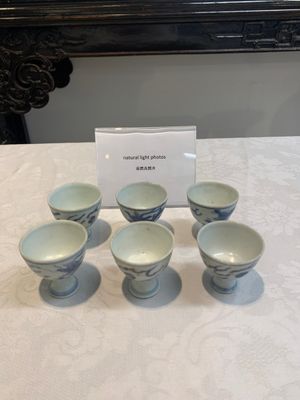 Six Chinese blue and white 'Hatcher cargo' stem cups with dragons, Transitional period — photo 1