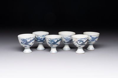Six Chinese blue and white 'Hatcher cargo' stem cups with dragons, Transitional period