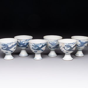 Six Chinese blue and white 'Hatcher cargo' stem cups with dragons, Transitional period — photo 1