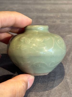 Six Chinese Longquan celadon jarlets with incised floral design, Yuan/Ming — photo 19