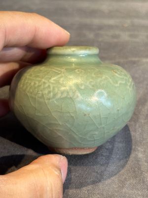 Six Chinese Longquan celadon jarlets with incised floral design, Yuan/Ming — photo 31