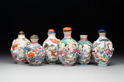 Six Chinese moulded famille rose snuff bottles, Qianlong mark, 19th C.