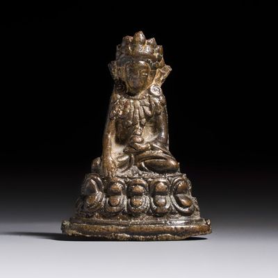 TBC PRICE A small Sino-Tibetan copper alloy figure of a crowned Buddha, 18/19th C., 17/18th C.