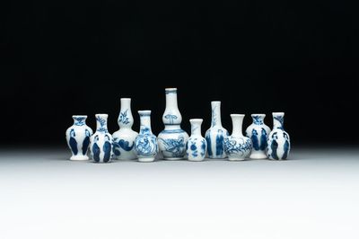 Ten Chinese blue and white miniature vases with figural and floral design, Kangxi