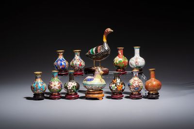 Ten Chinese cloisonné miniature vases, a goose and a duck-from covered box, on wooden stands, 20th C.
