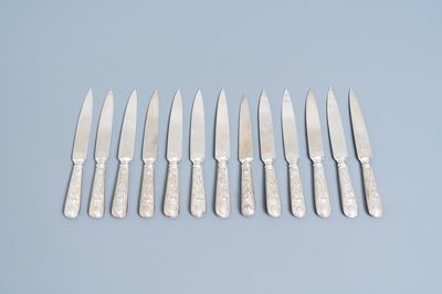 Thirteen Chinese silver knives with dragon handles, 19th C.