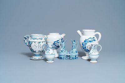 Three blue and white Dutch Delft, Nevers and Rouen wet drug jars and four jugs, 17/18th C.