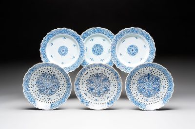 Three blue and white Dutch Delft strawberry strainers on stands, 18th C.